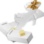 Pack Dúo de dos bidés portátiles Bootyful, presentados juntos con un lazo de regalo dorado, ideal para parejas o familias.